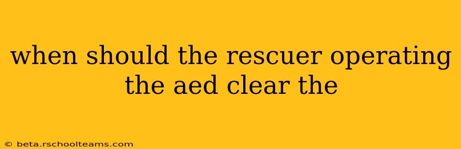 when should the rescuer operating the aed clear the