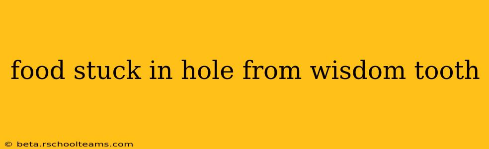 food stuck in hole from wisdom tooth