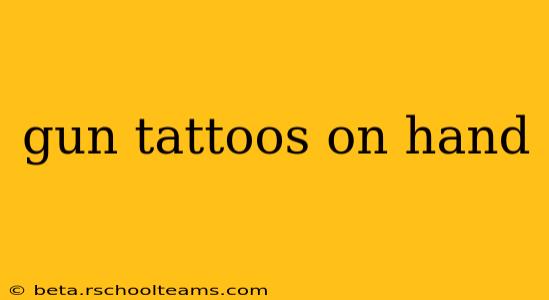 gun tattoos on hand