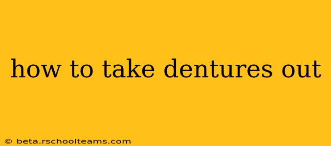 how to take dentures out